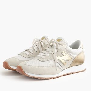 Gold New Balance Sneakers